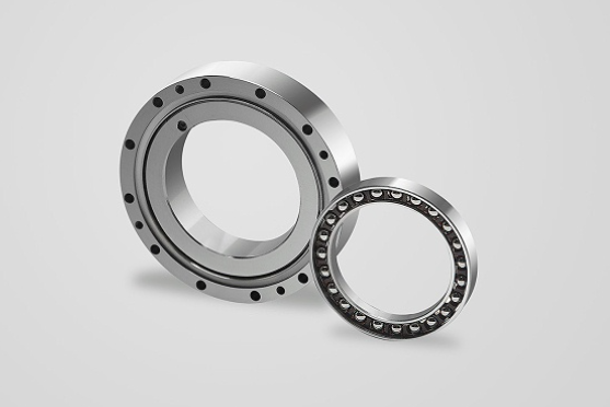 What are the differences in structure and usage between angular contact ball bearings and deep groove ball bearings?